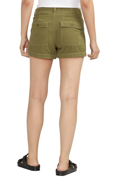 Shop Silver Jeans Co. High Waist Denim Cargo Shorts In Green