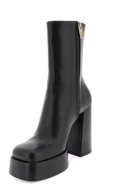 Shop Versace 'aevitas' Boots