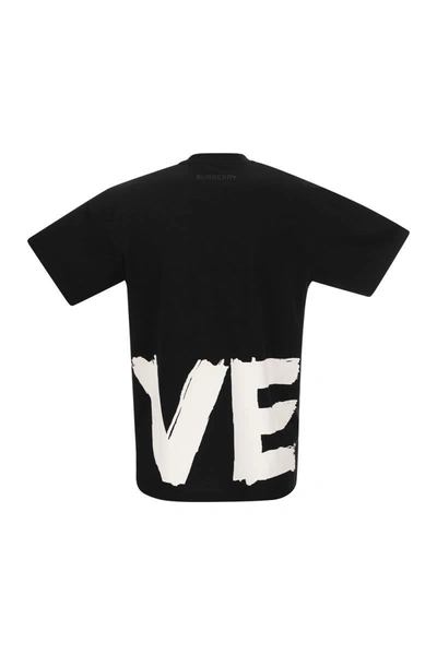 Shop Burberry Carrick - Love Print Cotton Oversized T-shirt In Black