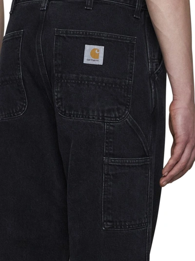 Shop Carhartt Wip Jeans In Black Stone Washed