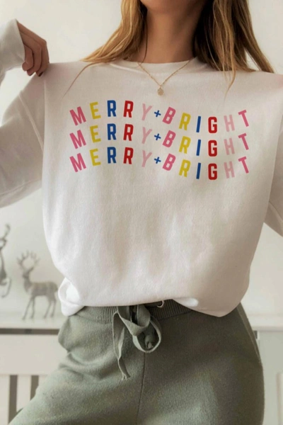 Shop Wknder Merry And Bright Crewneck Sweatshirt In White, Red, Blue, Yellow, Pink