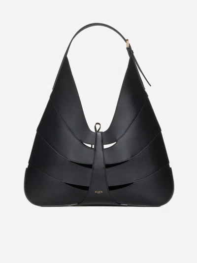 Shop Alaïa Delta Leather Hobo Bag In Black