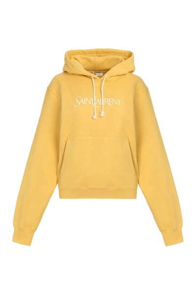 Shop Saint Laurent Cotton Hoodie In Yellow