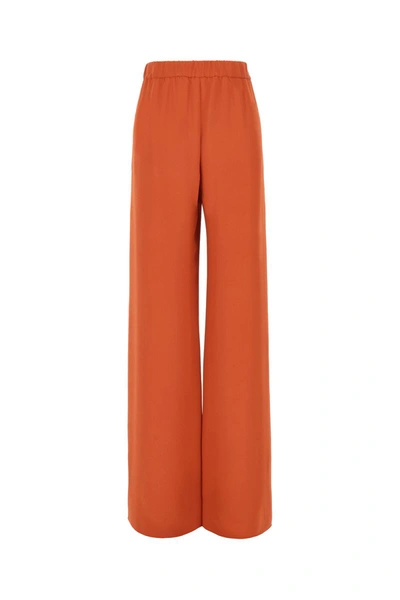 Shop Valentino Silk Wide-leg Trousers In Orange