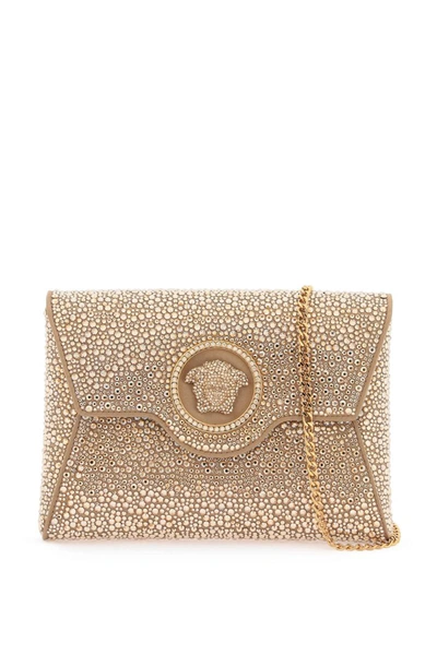 Shop Versace La Medusa Envelope Clutch With Crystals In Beige