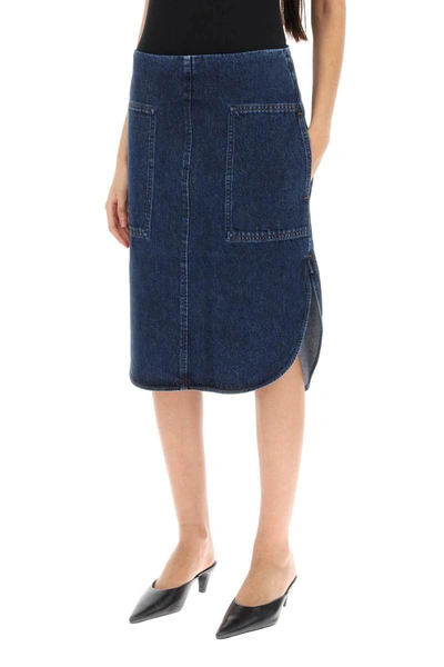 Shop Totême Toteme Curved Hem Denim Skirt In Blue