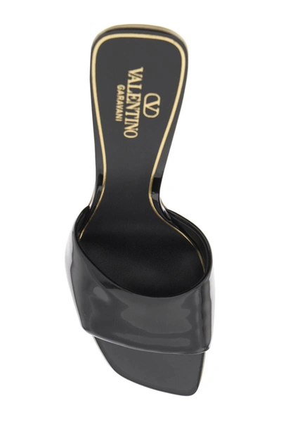 Shop Valentino Garavani Hyper One Stud Sandals In Patent Leather In Black