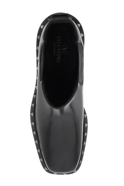 Shop Valentino Garavani Rockstud M-way Ankle Boots In Black