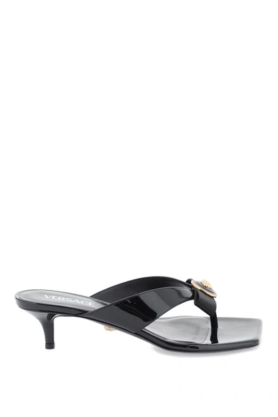 Shop Versace Gianni Ribbon Thong Mules In Black