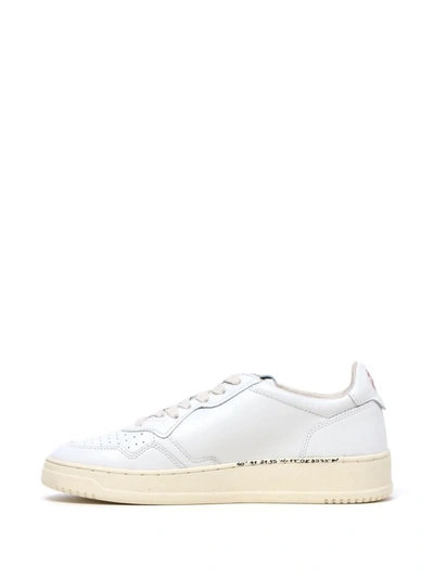 Shop Autry Sneakers In White