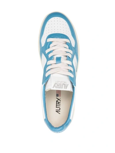 Shop Autry Sneakers In Clear Blue