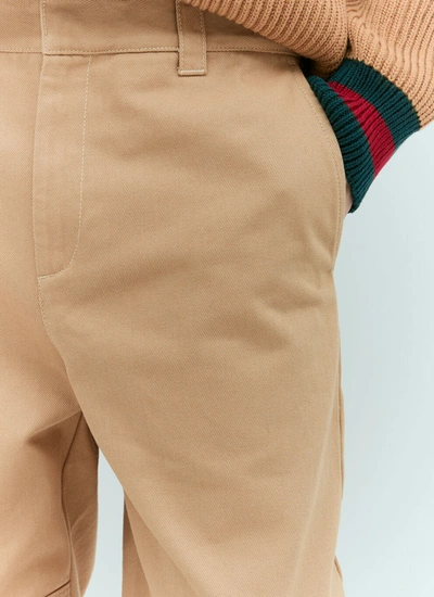 Shop Gucci Men Gg Knee-panel Pants In Cream