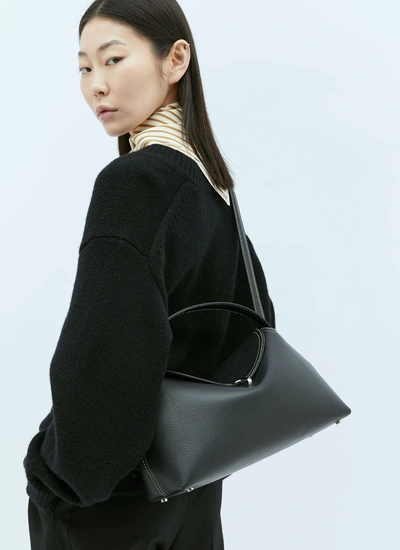 Shop Totême Toteme Women T-lock Leather Handbag In Black