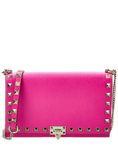 Shop Valentino Rockstud Grainy Leather Crossbody In Pink