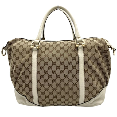 Shop Gucci Gg Canvas Beige Canvas Travel Bag ()