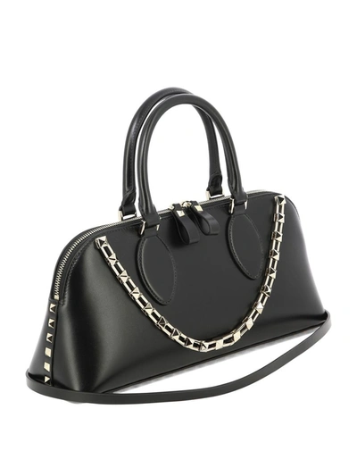 Shop Valentino Garavani "rockstud" Handbag In Black