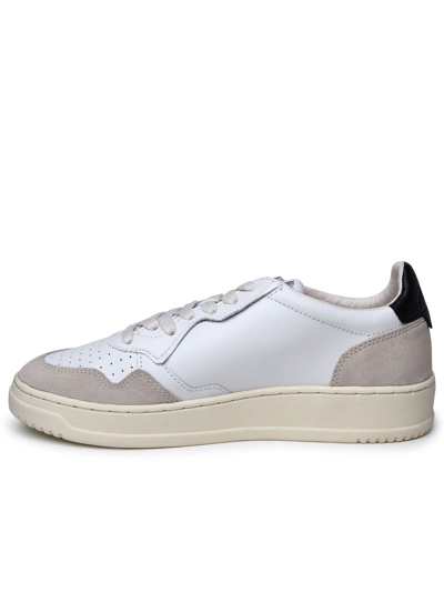 Shop Autry White Leather Sneakers In Bianco/nero