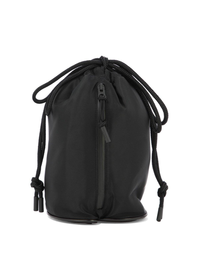 Shop Sacai Monogram-embroidered Drawstring Bucket Bag In Black