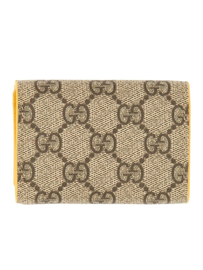 Shop Gucci Gg Detailed Mini Wallet In Crop