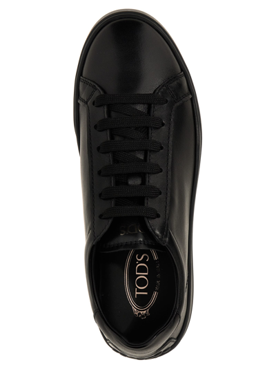 Shop Tod's Leather Sneakers In Black