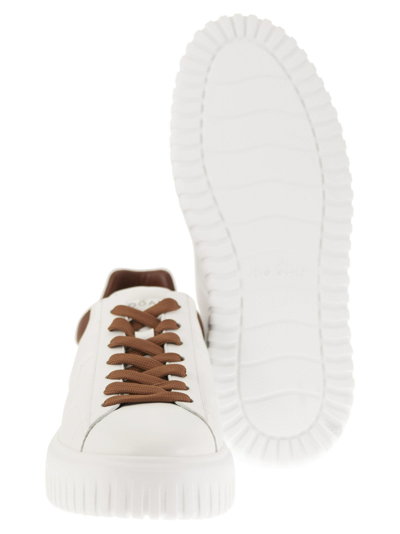 Shop Hogan H-stripes - Sneakers In White