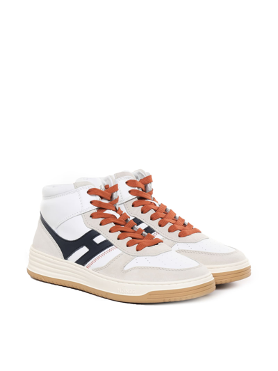 Shop Hogan High Top Sneakers In White