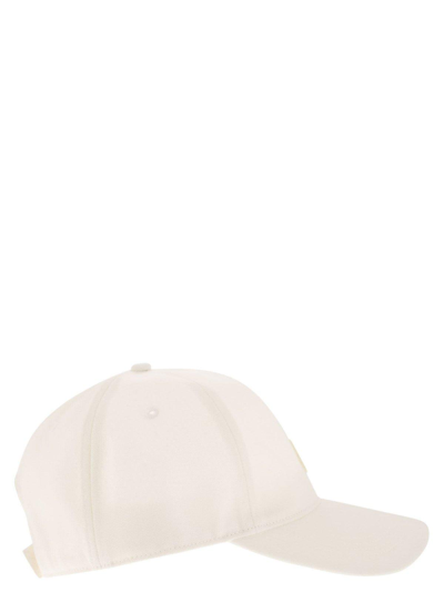 Shop Moncler Logo Patched Baseball Cap In Beige