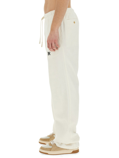 Shop Palm Angels Monogram Pants In Bianco