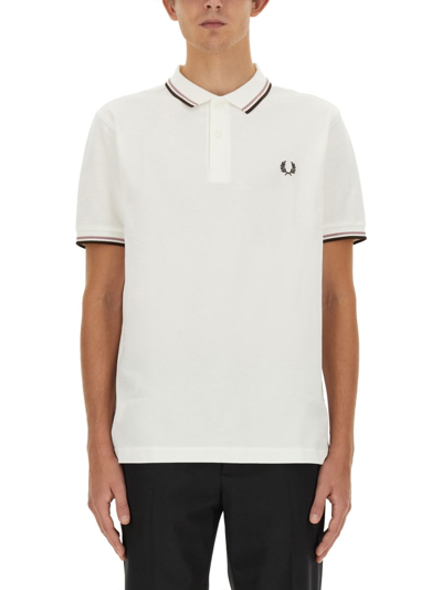 Shop Fred Perry Polo With Logo In Swht/dpnk/btobac