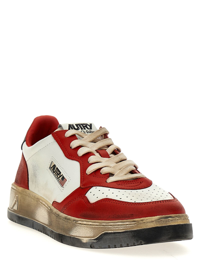 Shop Autry Super Vintage Sneakers In Wht/blk/flame