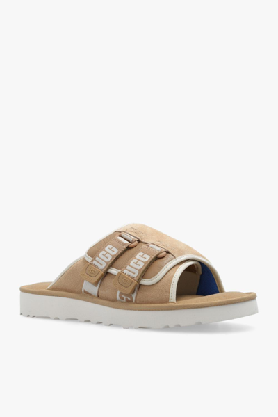 Shop Ugg Goldencoast Slides In Ssnt Sand / Santorini