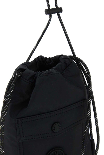 Shop Moncler Logo Patch Drawstring Crossbody Bag In Black