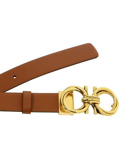 Shop Ferragamo Logo Engraved Buckled Belt In Brown
