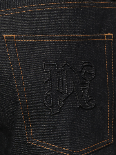 Shop Palm Angels Jeans In Black
