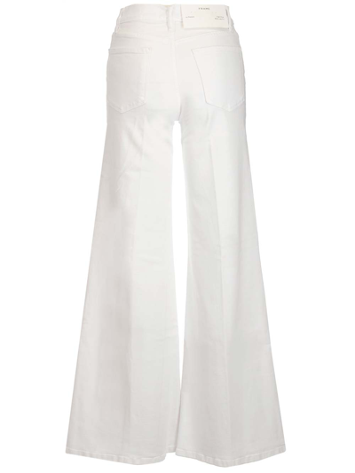 Shop Frame Flared Jeans In Blanc Blanc