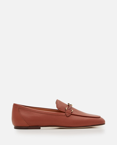 Shop Tod's Flat Leather Loafers In Brown