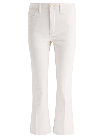 Shop Frame Low-rise Flared Jeans In Blanc Blanc