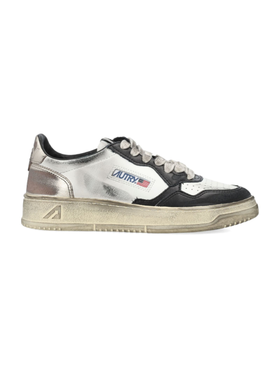 Shop Autry Medalist Super Vintage Low Sneakers In Wht Blk Platino