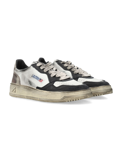 Shop Autry Medalist Super Vintage Low Sneakers In Wht Blk Platino
