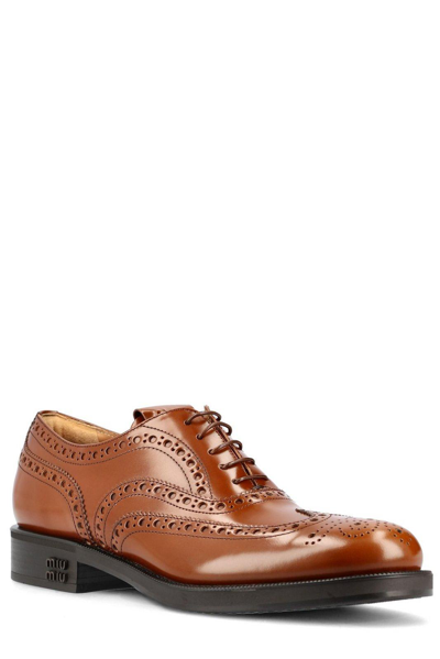 Shop Miu Miu Perforated Lace-up Shoes In Brown