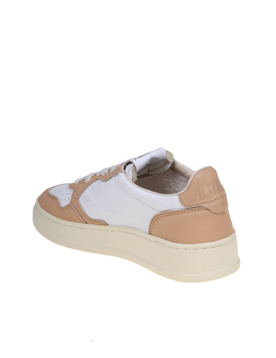 Shop Autry Sneakers In White And Caramel Leather In Wht Caramel