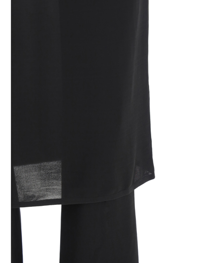 Shop Alaïa Skirt Pants In Black