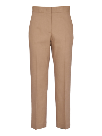 Shop Msgm Concealed Trousers In Sand