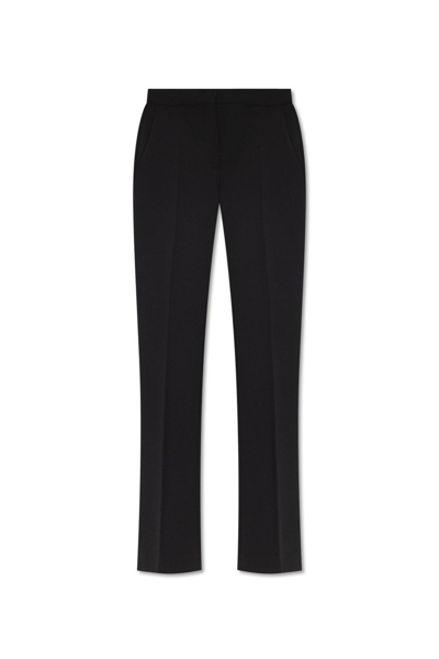 Shop Moschino Pleat Front Trousers  In Black