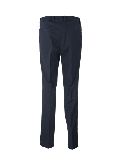 Shop Brunello Cucinelli Garment-dyed Leisure Fit Trousers In American Pima Comfort Cotton With Pleats In Navy