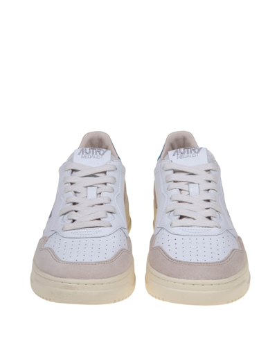Shop Autry Sneakers In White And Turquoise Leather And Suede In Bianco/azzurro