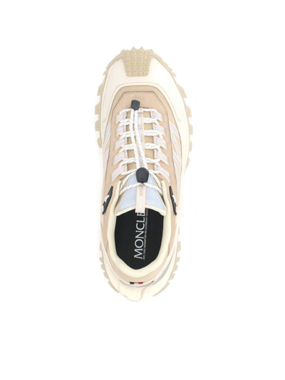 Shop Moncler Sneakers In Beige/white