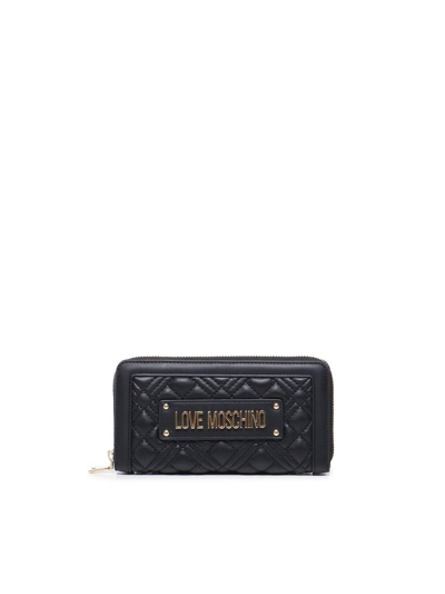 Shop Love Moschino Quilted Zip Around Wallet In Black