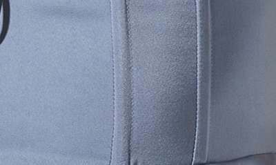 Astr Ruffle Puff Sleeve Satin Peplum Blouse In Slate Blue