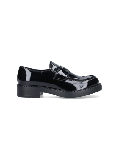 Prada Round-toe Loafers In Black
